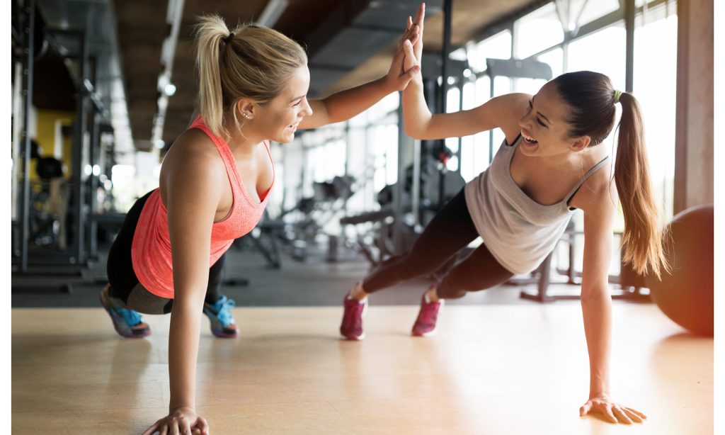 beautiful women working out in gym